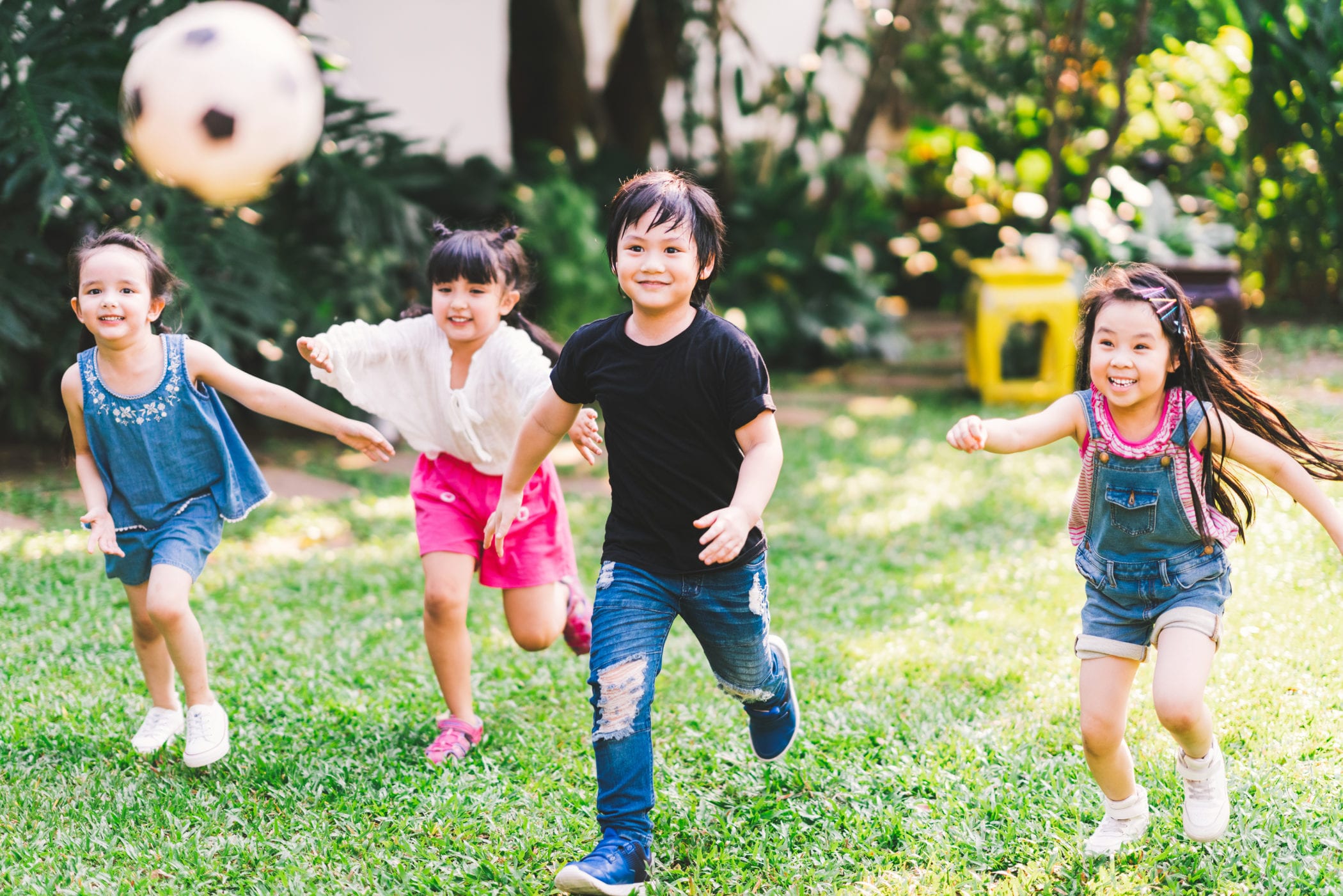 Kindergarten children playing sports