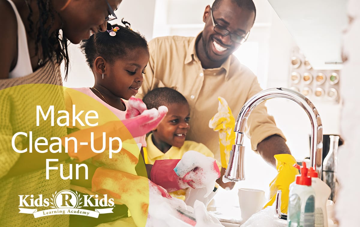 Family washing dishes together